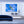 Modern living room with blue velvet sofa and wall art of a flying bird against blue sky