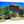 Acrylic photo print featuring a large mushroom-shaped rock formation in a sunny forest landscape