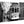 Black and white acrylic photo print of vintage tram on narrow city street with pedestrians