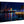 Acrylic photo print of a vibrant night harbor scene with colorful lights and reflections.