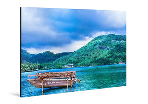 Acrylic photo print of a rustic boat on a blue lake with lush green mountain scenery