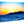 Glossy aluminum Dibond photo print of a vivid seascape with sunset and rugged coastline.