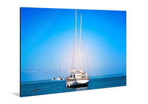 Glossy aluminum photo print of sailboats on calm blue ocean under clear sky