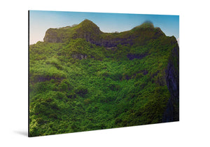 Glossy aluminum wall art print of lush green mountain landscape with blue sky