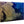 Direct print on wood featuring aerial ocean view with detailed coral reef and blue water