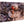 Direct print on wood of two hermit crabs on rocky, sandy ground with shells
