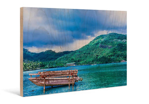 Direct print on wood of a scenic lake with boat, lush green hills, and cloudy sky