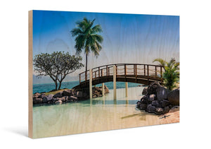 Tropical beach bridge scene printed on wood, featuring palm trees and clear blue water
