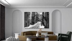 Modern living room with large black and white city street photo wall art, stylish decor