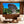 Modern living room with two beige chairs, marble coffee table, and large landscape wall art featuring a mushroom-shaped rock formation in nature.