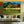 Modern living room with tropical landscape wall art, plush sofa, and gold accents