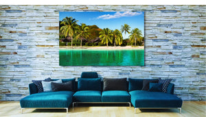 Modern living room with teal sectional sofa, stone accent wall, and tropical landscape wall art