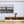 Modern living room with a black and white beach photography wall art, minimalist decor