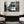 Elegant living room with classical armchairs and black and white tram street art wall decor