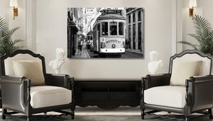 Elegant living room with classical armchairs and black and white tram street art wall decor