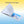 Open photo book with landscape photography and poetry on a blue and yellow background