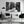 Modern living room with black and white city street photo wall art, minimalist decor