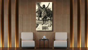 Framed black and white photo of Polynesian statue art displayed in modern living room