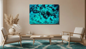 Modern living room with underwater ocean art print on wall, neutral decor, blue rug