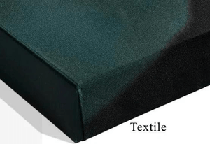 Close-up of a stretched textile canvas with dark green and black abstract pattern