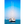 White sailboat with tall masts anchored on calm blue sea under clear sky