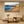 Coastal landscape wall art with rocky shore and blue sea in modern minimalist living room