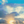 Sunrise or sunset sky with vibrant clouds and sunlight shining through, landscape photography