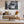 Modern living room with neutral sofa, green armchair, and tram street art wall decor