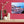 Modern living room shelf with decorative vases and wall art cityscape photo print