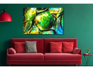 Modern living room with green walls, red sofa, wall art featuring colorful abstract shells