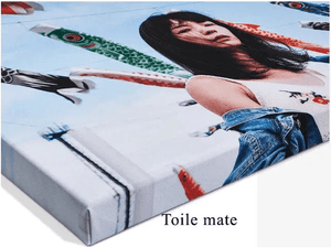 Canvas print of a woman outdoors with koi fish kites, matte finish wall art