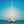 Sailboat anchored on calm blue sea with clear sky and distant boats
