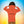 Child wearing orange eco-friendly hoodie with 'I am wise!' text on back, colorful background