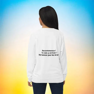 Woman wearing white unisex eco-friendly sweatshirt with French motivational text on back