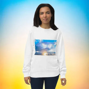 Woman wearing white unisex eco-friendly sweatshirt with sky and sunrise photo print
