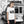 Girl wearing white organic cotton t-shirt with black and white tram print, urban background.