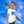 Child wearing white organic cotton t-shirt with bird print, standing against blue sky background