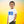 Boy wearing organic cotton kids t-shirt with flying dinosaur print on white background