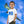 Child wearing organic cotton t-shirt with bird print, standing in front of blue sky and bird