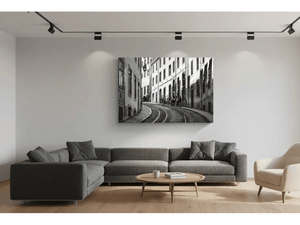 Modern living room with black and white urban street photography canvas and sectional sofa