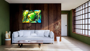 Modern living room with white sofa, wooden wall, and colorful abstract art on display