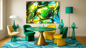 Modern dining room with green and yellow chairs, round marble table, abstract shell wall art